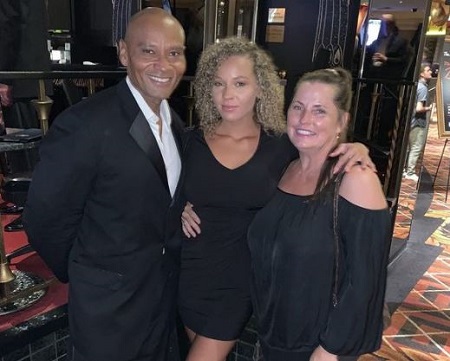 Cheyenne Elliott (middle) with her parents David Elliott and Lisa Gressett.